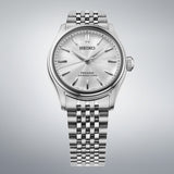 Seiko Presage HCC001J1 wristwatch with stainless steel band and white dial, showcasing elegant and classic watch design.