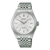 Seiko Presage HCC001J1 wristwatch with stainless steel case, white dial, and leather strap, showcasing elegant watch design.
