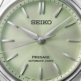 Seiko Presage HCC002J1 wristwatch with stainless steel band, white dial, and elegant design, showcasing time and date display.