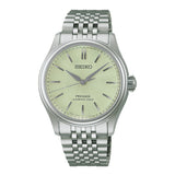 Seiko Presage HCC002J1 watch with stainless steel case and white dial, featuring elegant design and silver hour markers.