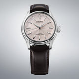 Seiko Presage HCC003J1 men's watch with stainless steel band and white dial, featuring elegant design and date display.
